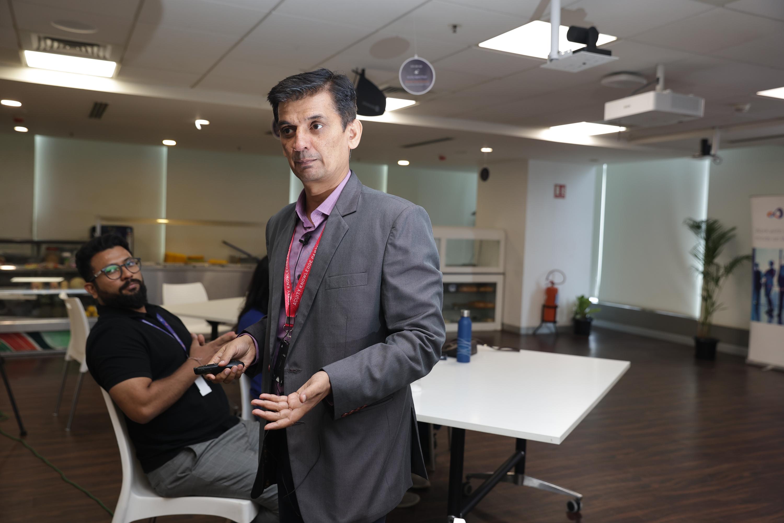 Sanjay Saini presenting the AI Business Case