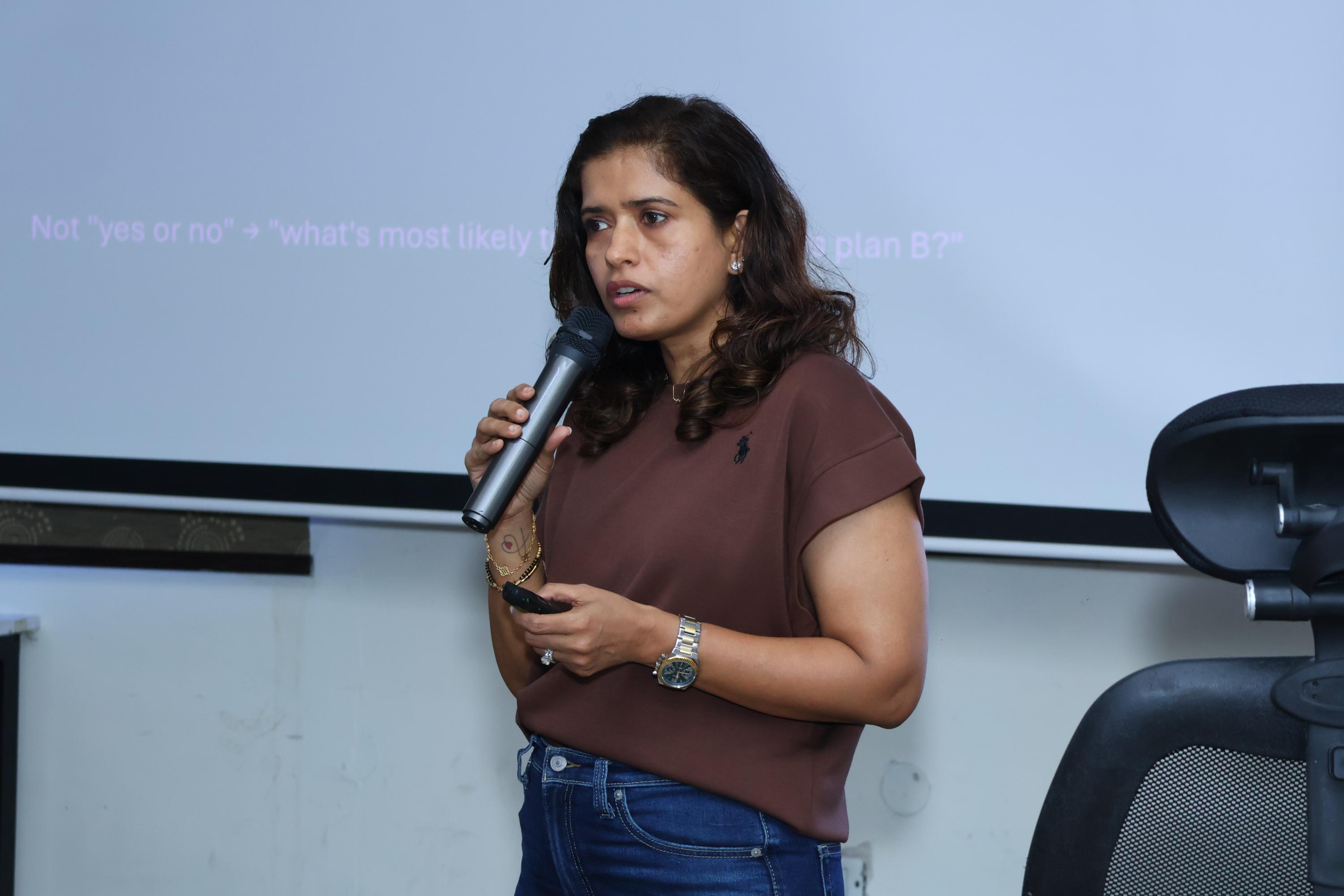 Minu Sachdeva presenting